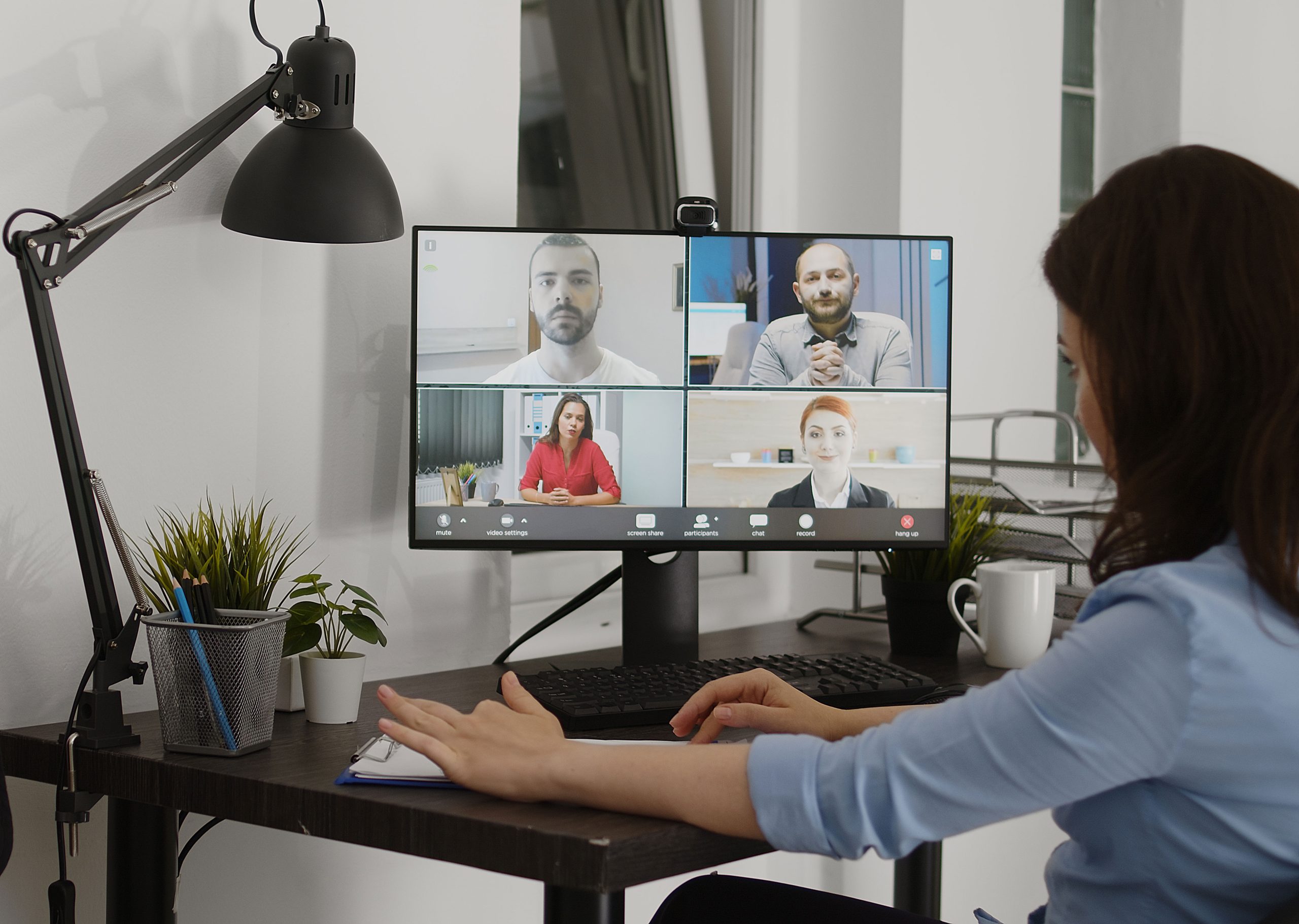 executive-manager-attending-videocall-meeting-webcam-talking-people-about-marketing-vision-desk-female-employee-using-online-videoconference-call-coworking-space-business-agency